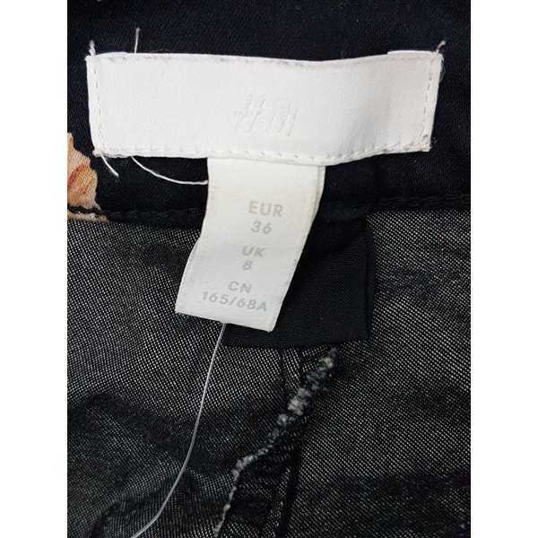 Pantaloni dama cu motive florale H&M