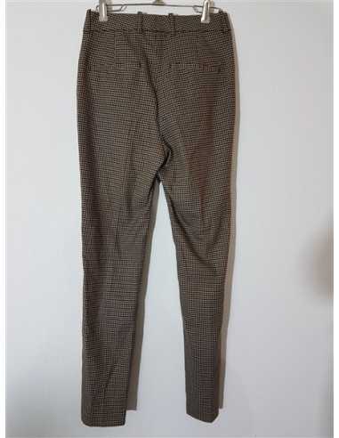 Pantaloni dama in patratele cu buzunare